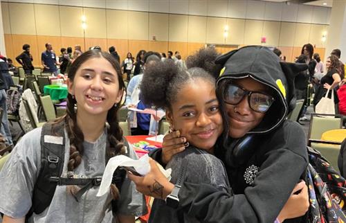 3 girls smiling in the picture