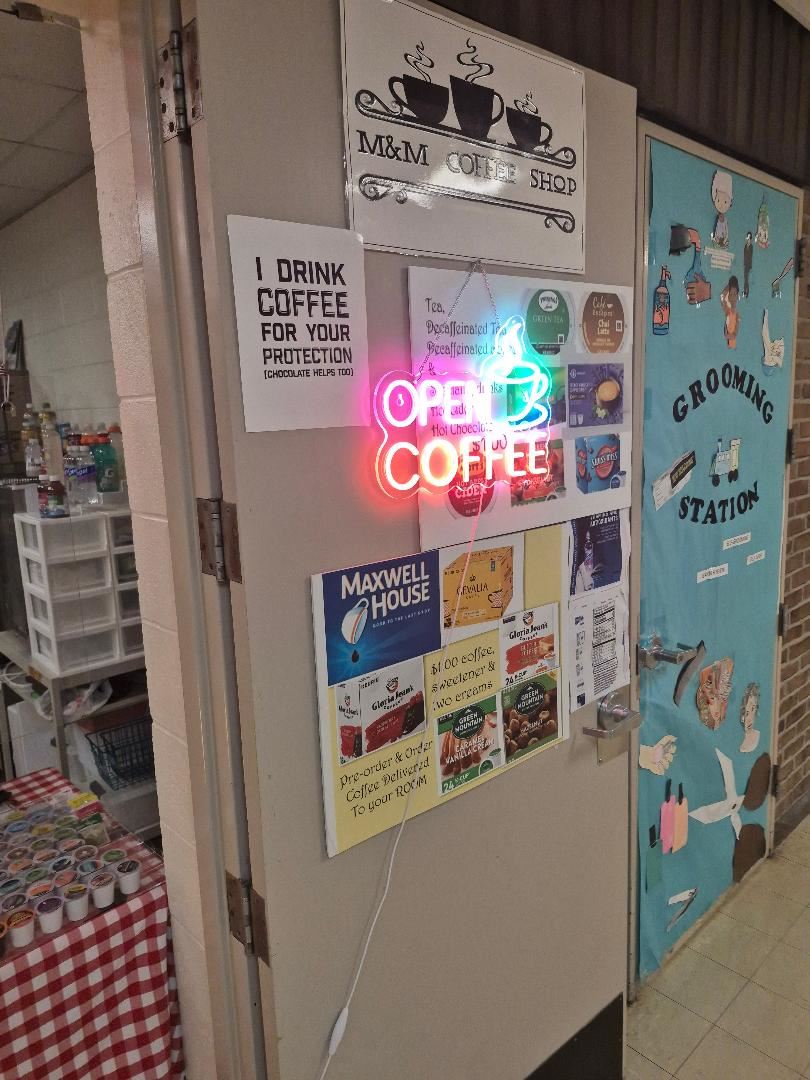  Sign adorning the M & M coffee shop