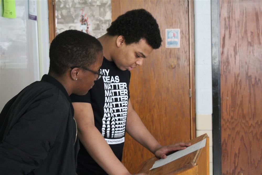 Students presenting in class.