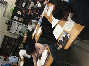 students working on their comics 