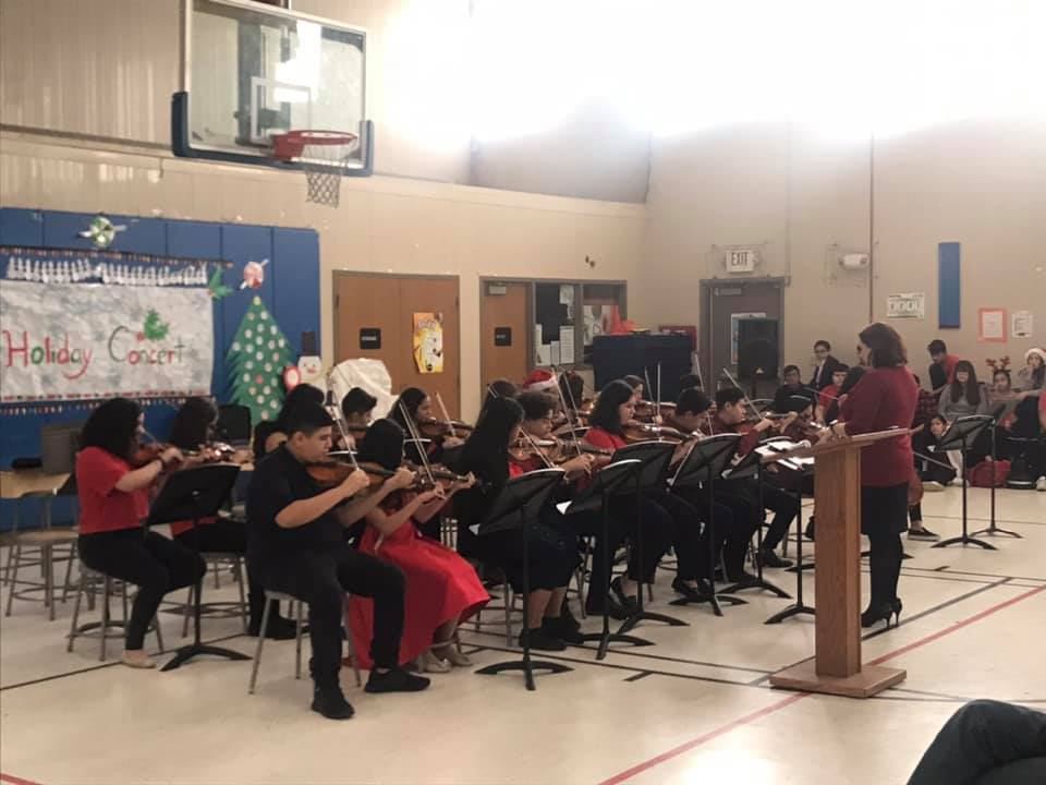 strings band performing at the holiday concert