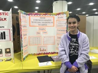 Fatima Morales and her "Paper Chromatography" science fair project board.  