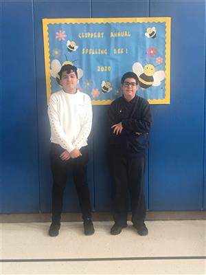 Manny and Mauricio spelling bee champions 