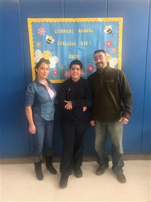 Mauricio with his parents 
