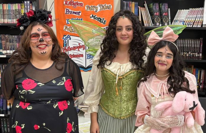  students wearing halloween costumes