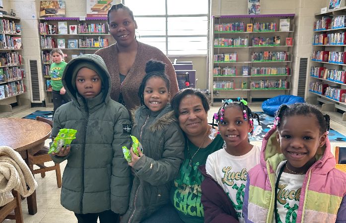  Principal Scott and students and parent at library