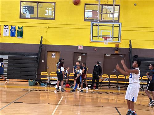 Students playing basketball