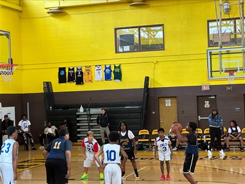 students playing basketball