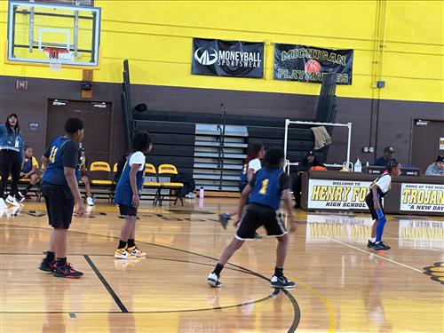 students playing basketball