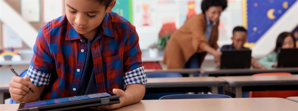  boy using a tablet