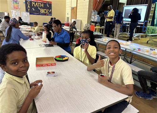 students having fun playing Uno.