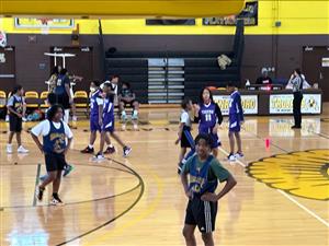 basketball team playing basketball