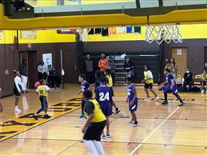 basketball team playing basketball