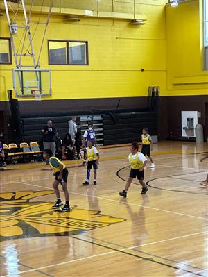 basketball team playing basketball
