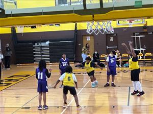 basketball team playing basketball