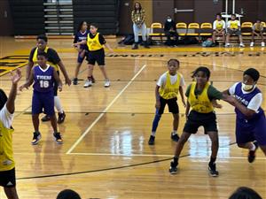 basketball team playing basketball
