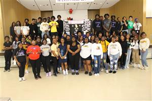 Students wearing college shirts