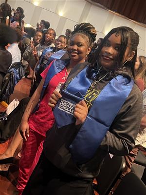 Students getting ready to accept award