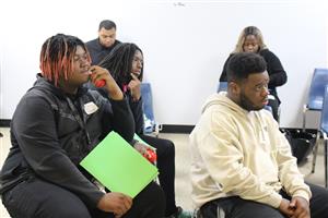 Students listening to presenter