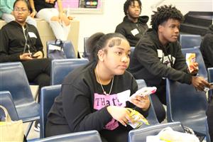 Students listening to presenter