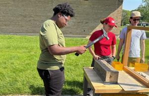 Students working with hammer