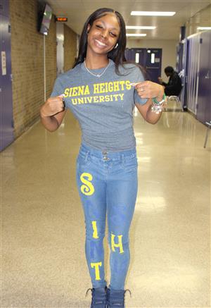 Student with Siena Heights shirt on