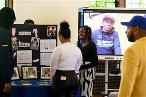 Scholars presenting their senior internships