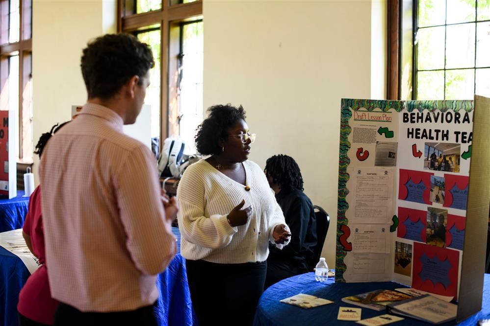  Scholar presenting their internship project. 