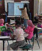  student in class learning math 