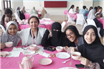  teachers, students and parent having tea 