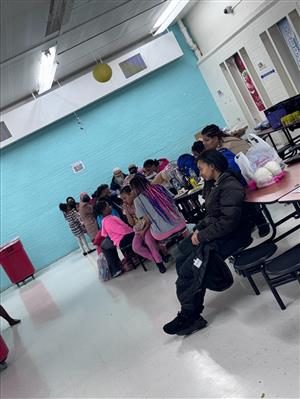  parents with daughters at the PTA Meeting