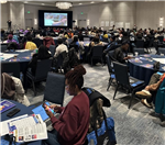  Parents and staff at a conference 