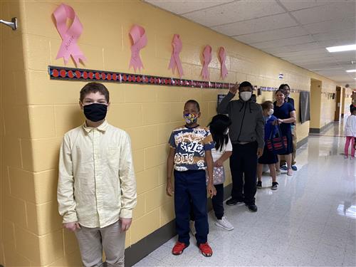 Students lined up in the hallway