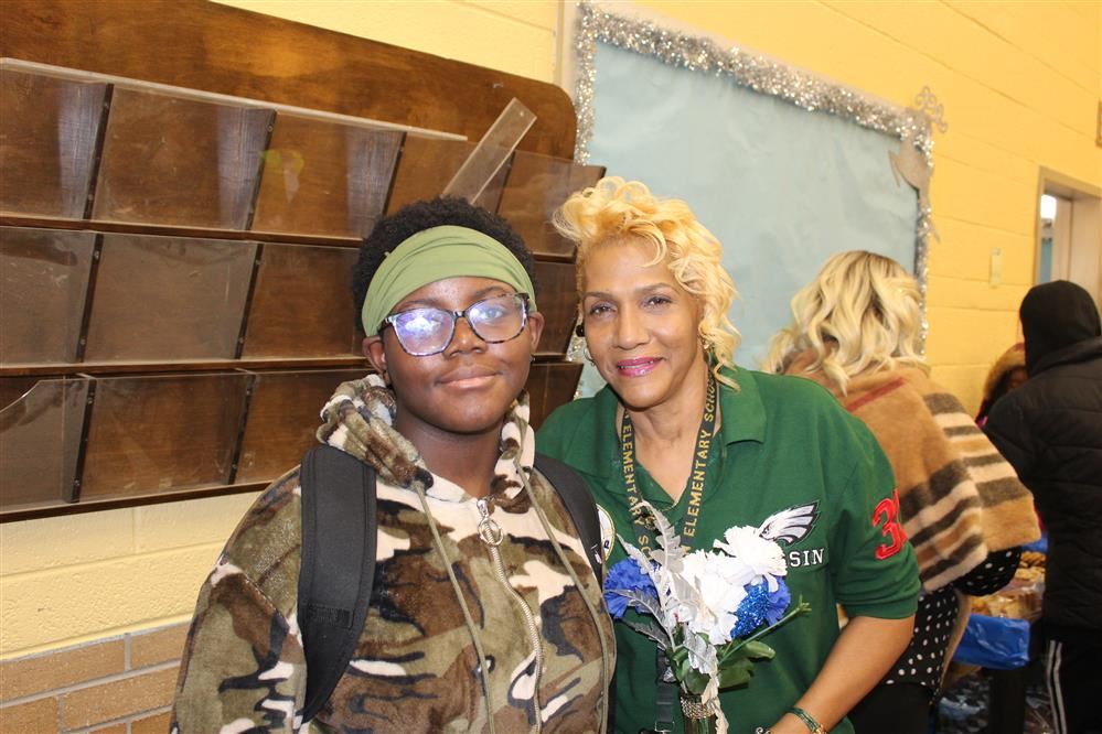  Dossin student poses with Attendance Agent Edwards
