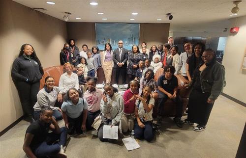 Students and staff inside the Detroit's City Counsel area