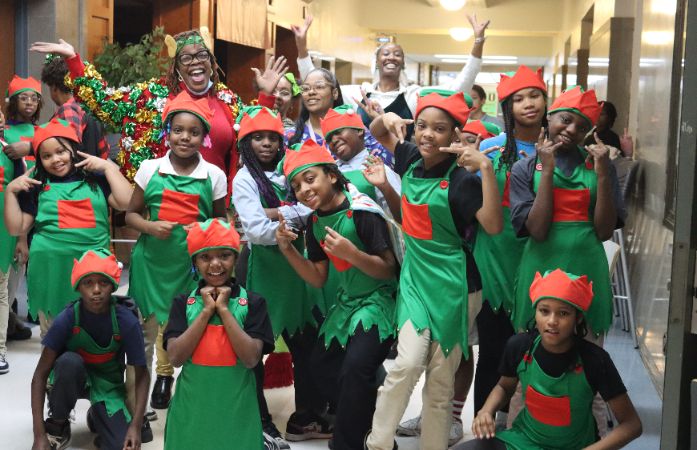  Students dressed in holiday costumes with all smiles.