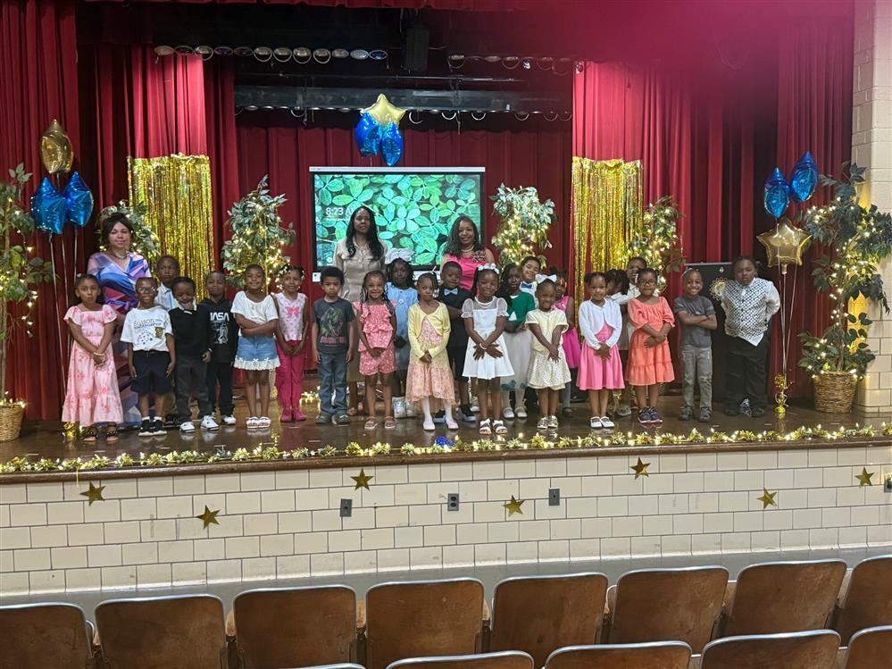  group photo of three adults and future first grade students