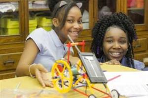 girls with a STEM mobile 