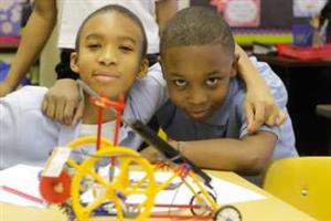 boys with a STEM mobile 