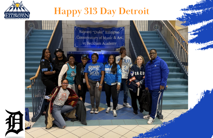 A group staff members celebrating Detroit 313 day!