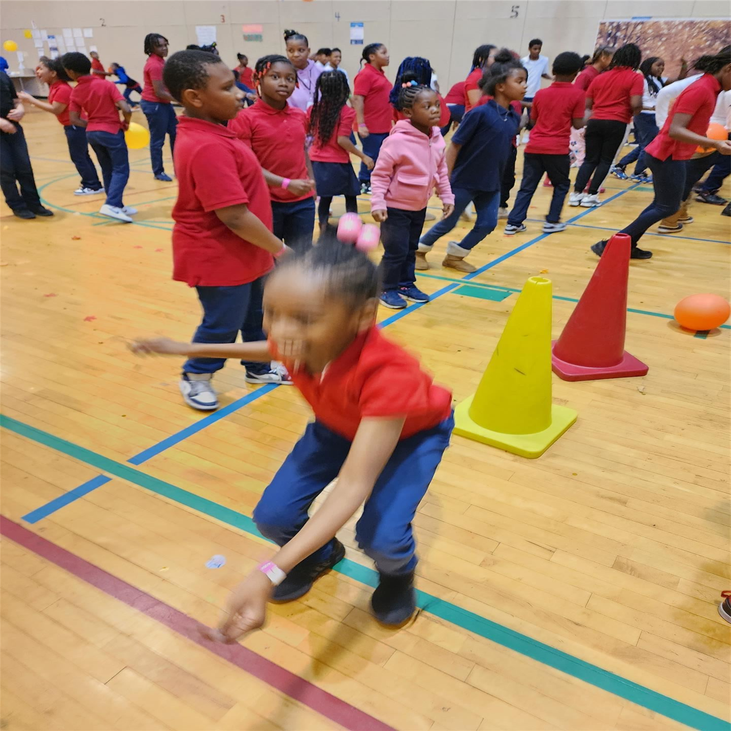 Students dancing in school gym