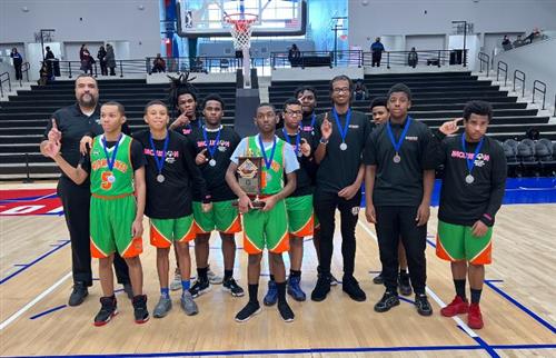 Team holding runner up trophy