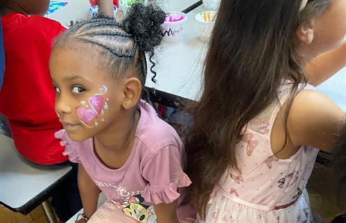 studnet with face painting