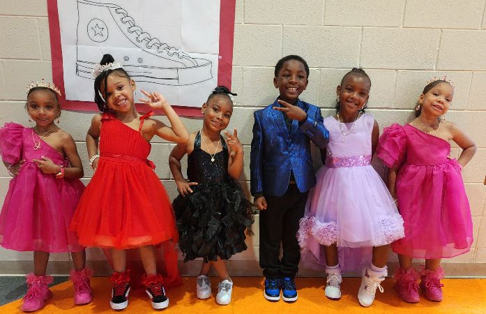  Little boy and girls dressed up