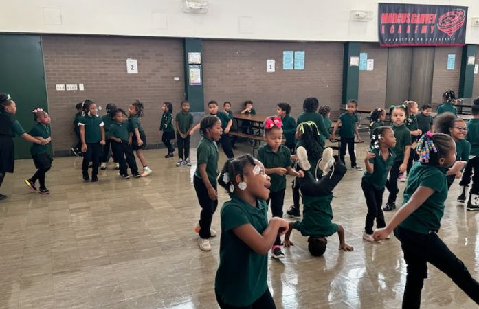  Students singing and dancing