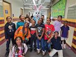 Students with bunny