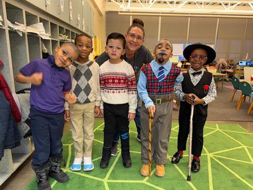  Teacher with  5 boys acting old men 