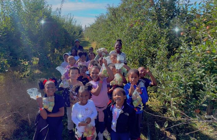  Students and teacher at the Apple Orchard 