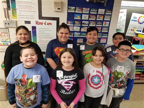 4th Graders wearing Super Hero gear and their Count Day stickers  