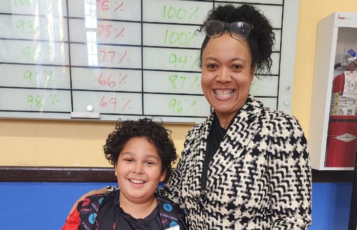  4th grader, Abi smiling for being our pizza raffle winner